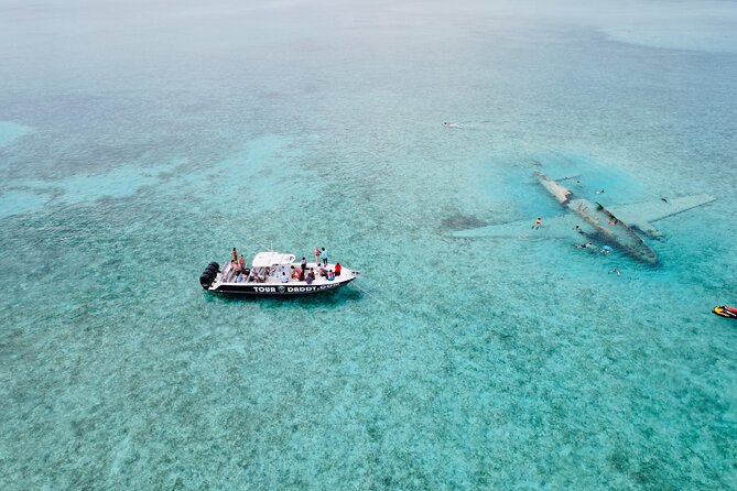 Exuma Full Day Swimming Pigs Group Boat Tour - The Pablo Escobar plane wreck