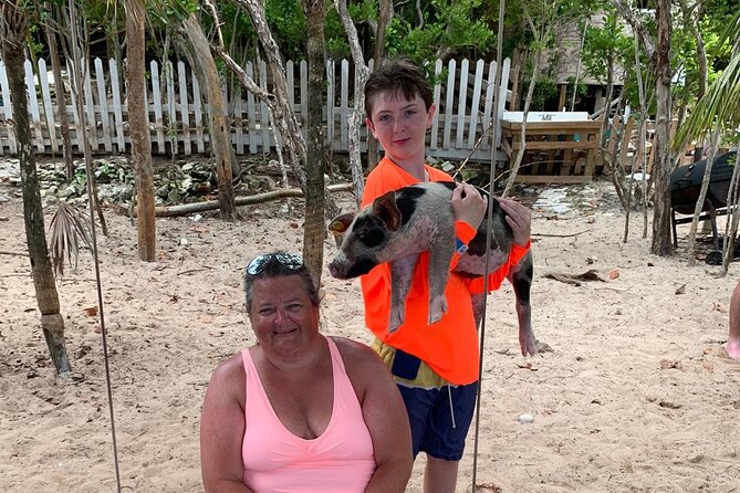 Luxury Catamaran Cruise: Sip, Sail, Snorkel, and Swim with Pigs! - Cruising Past Sandy Cay, the Original Gilligan’s Island