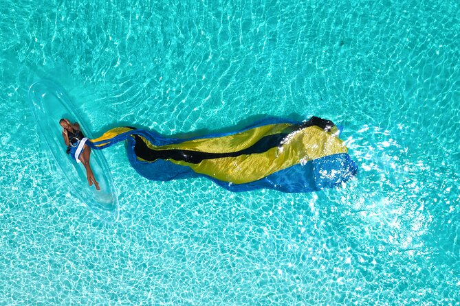 Nassau Clear Kayak Drone Photoshoot- Floating Dress - Working with the water representative