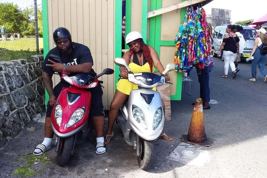 Nassau: Guided Scooter/ATV Rental or Tour w/Beach Day Bundle - A busy Nassau day on two wheels