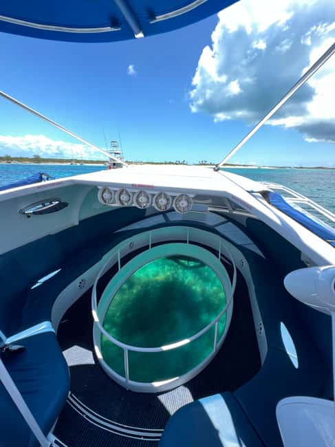 Paradise Island: Glass-Bottom Boat Tour with Live Commentary - Crossing to Athol Island