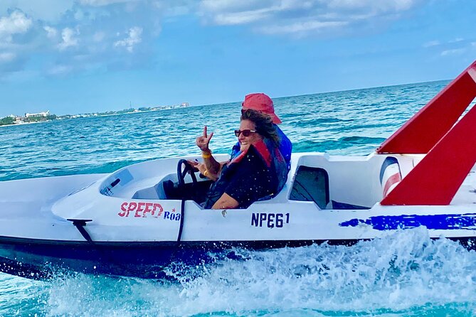 Self Drive Speedboat and Swim with the Pigs - Taking the wheel at Malcolm’s Park
